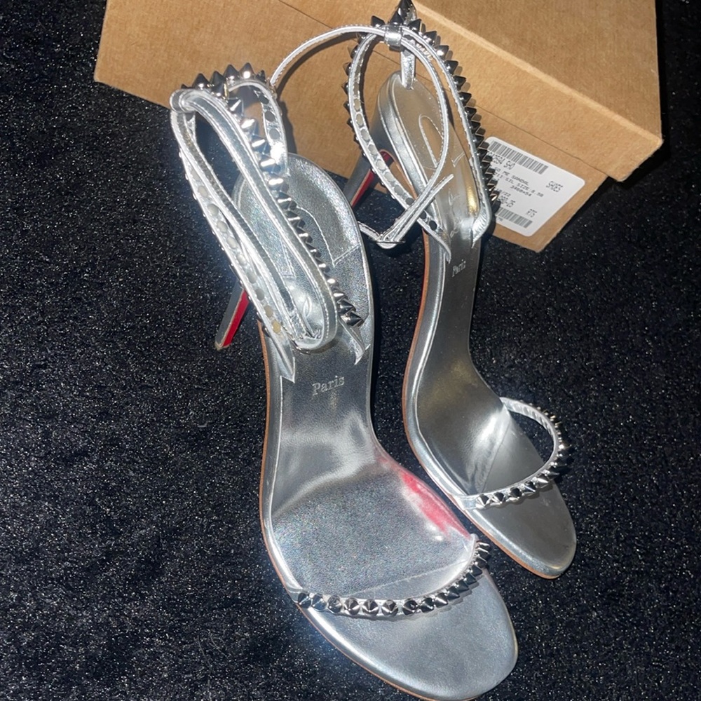 Christian Louboutin heels with studs. Only worn once.